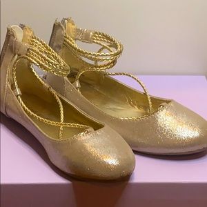 These are gold Madden girl flats.
